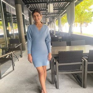 Cute sweater dress comes with a belt